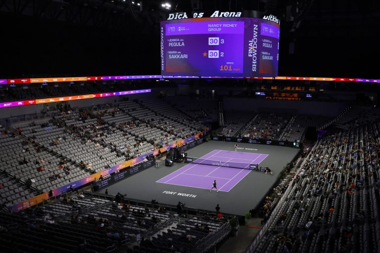 Jessica Pegula, front, and Maria Sakkari, rear, of Greece, play in the WTA Finals tennis tournament in Fort Worth, Texas, Monday, Oct. 31, 2022. (AP Photo/Ron Jenkins)