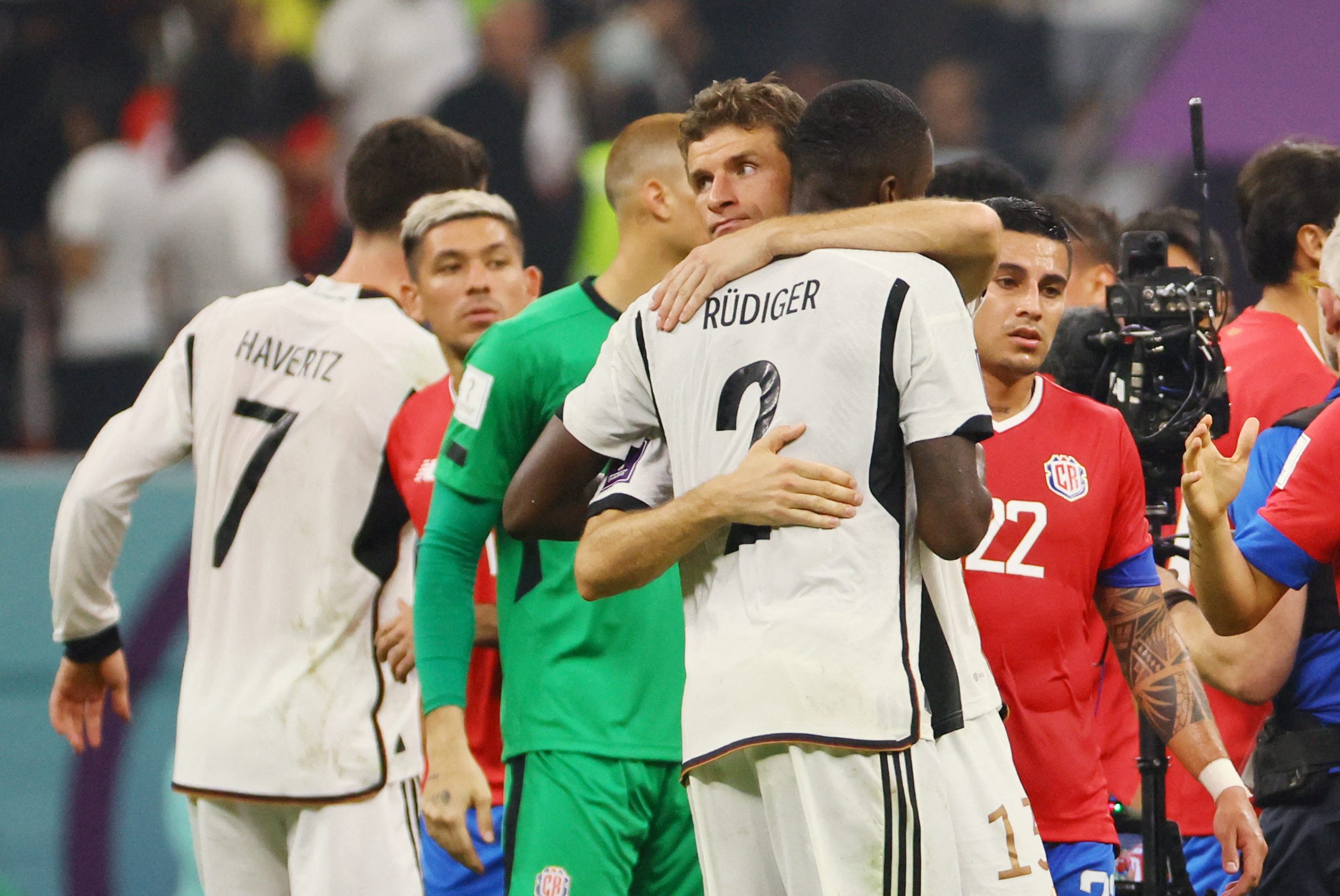 Soccer Football - FIFA World Cup Qatar 2022 - Group E - Costa Rica v Germany - Al Bayt Stadium, Al Khor, Qatar - December 1, 2022 Germany&#039;s Thomas Muller and Antonio Rudiger look dejected after the match as Germany are eliminated from the World Cup REUTERS/Wolfgang Rattay