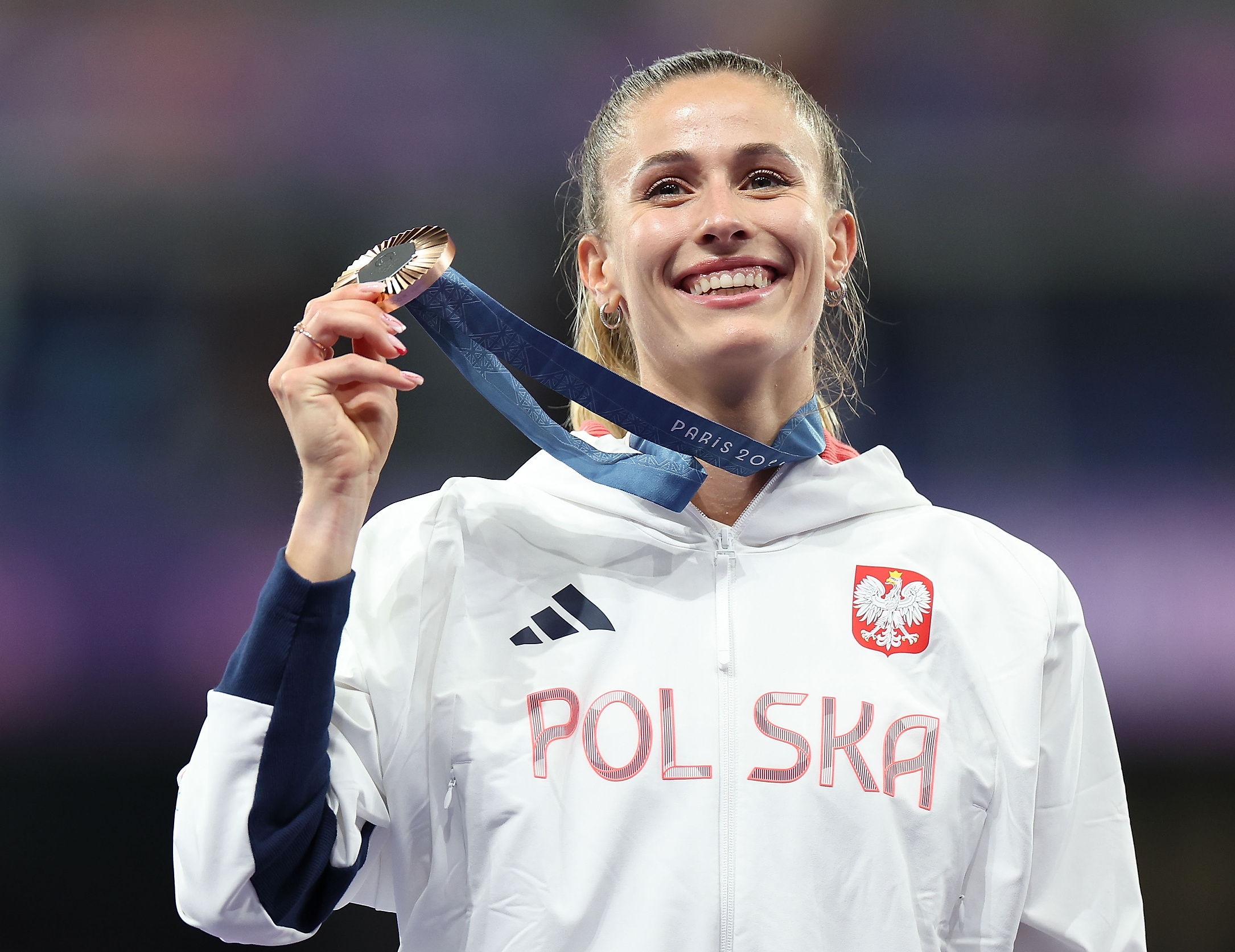 (240809) -- PARIS, Aug. 9, 2024 (Xinhua) -- Bronze medalist Natalia Kaczmarek of Poland reacts during the victory ceremony of the women&#039;s 400m of Athletics at the Paris 2024 Olympic Games in Paris, France, Aug. 9, 2024. (Xinhua/Li Ying)

2024.08.09 Paryz
sport , Igrzyska Olimpijskie Paryz 2024 , lekkoatletyka, lekka atletyka, reprezentacja Polski, Polska 
Bieg na 400 m kobiet - final
Natalia Kaczmarek z brazowym medalem
Foto Li Ying/Xinhua/PressFocus

!!! POLAND ONLY !!!