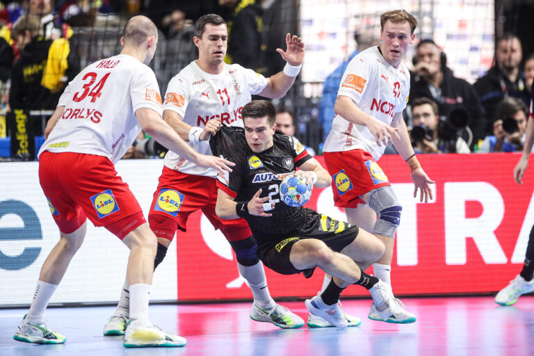 Renars Uscins of Germany is challenged by Simon Hald Jensen, Rasmus Lauge Schmidt and Simon Bogetoft Pytlick of Denmark during the Men&#039;s EHF Euro 2024 second semi-final match between Germany and Denmark at Lanxess Arena on January 26, 2024 in Cologne, Germany. Photo: Sanjin Strukic/PIXSELL/Sipa USA
2024.01.26 Kolonia
pilka reczna mezczyzn , Mistrzostwa Europy 2024 
Niemcy - Dania
Foto Sanjin Strukic/PIXSELL/SIPA USA/PressFocus

!!! POLAND ONLY !!!