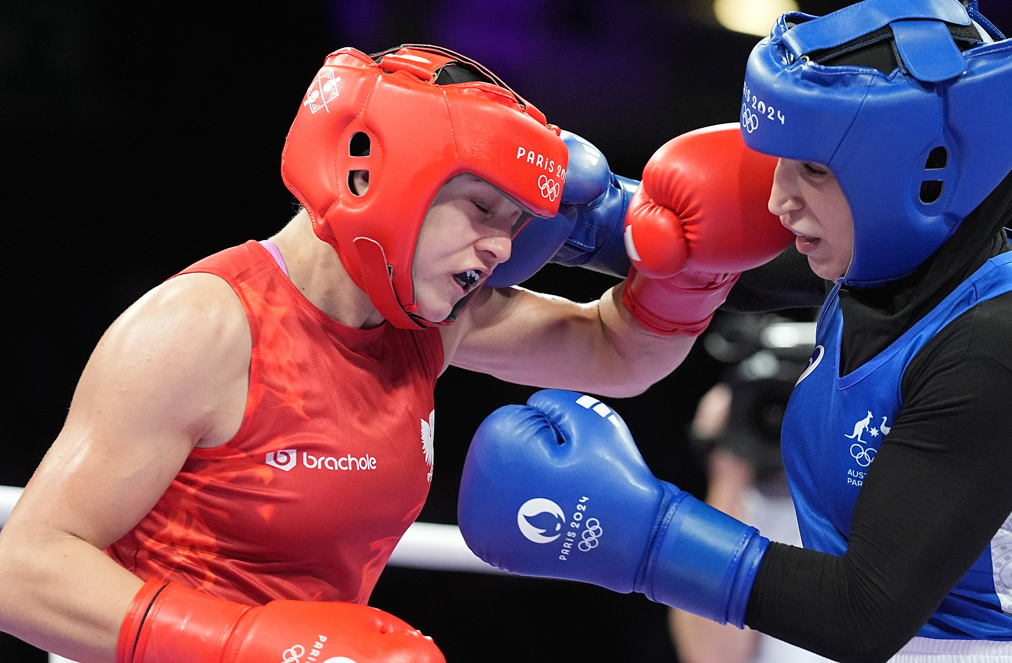 (240802) -- PARIS, Aug. 2, 2024 (Xinhua) -- Julia Szeremeta (L) of Poland competes with Tina Rahimi of Australia during the women&#039;s 57kg preliminaries round of 16 of boxing at the Paris 2024 Olympic Games in Paris, France, Aug. 2, 2024. (Xinhua/Jiang Wenyao)

2024.08.02 Paryz
Sport , Igrzyska Olimpijskie Paryz 2024 ,  Polska
Boks kobiet
Foto Jiang Wenyao/Xinhua/PressFocus

!!! POLAND ONLY !!!